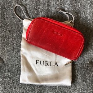 Red zip around coin purse